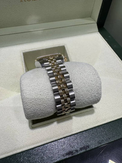 Montre femme 26 mm rolex lady just noir acier inoxydables or argent